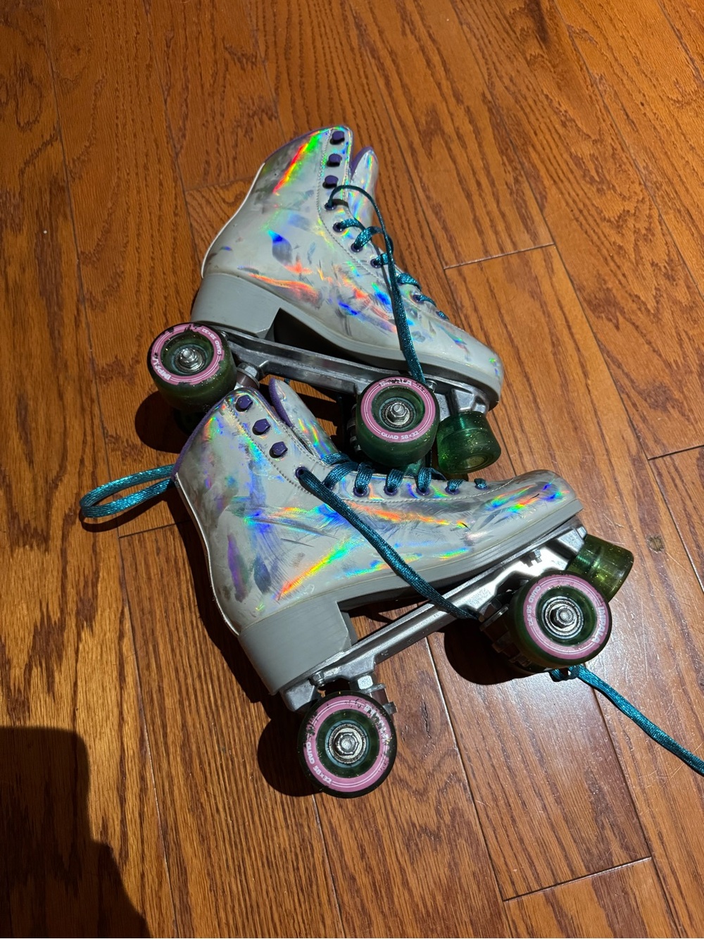 Impala holographic quad roller skates with blue sparkle laces